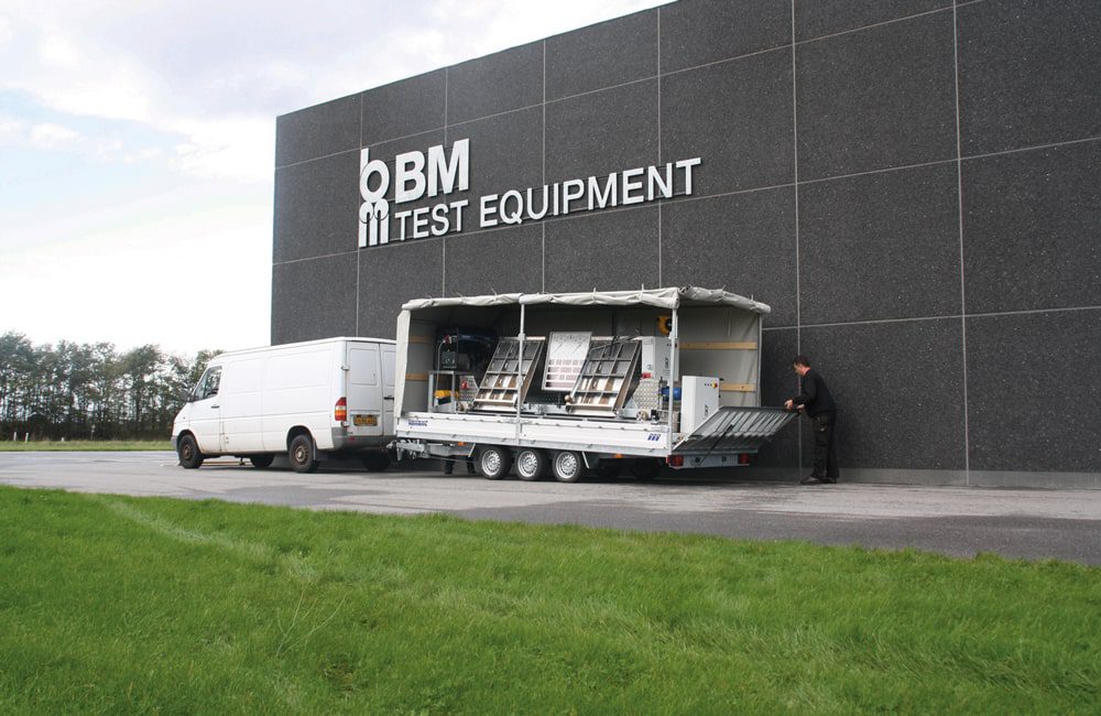 Towing vehicle arrives to site and trailer is opened