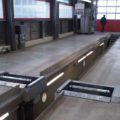 BM14200 roller brake tester installed over pit in workshop